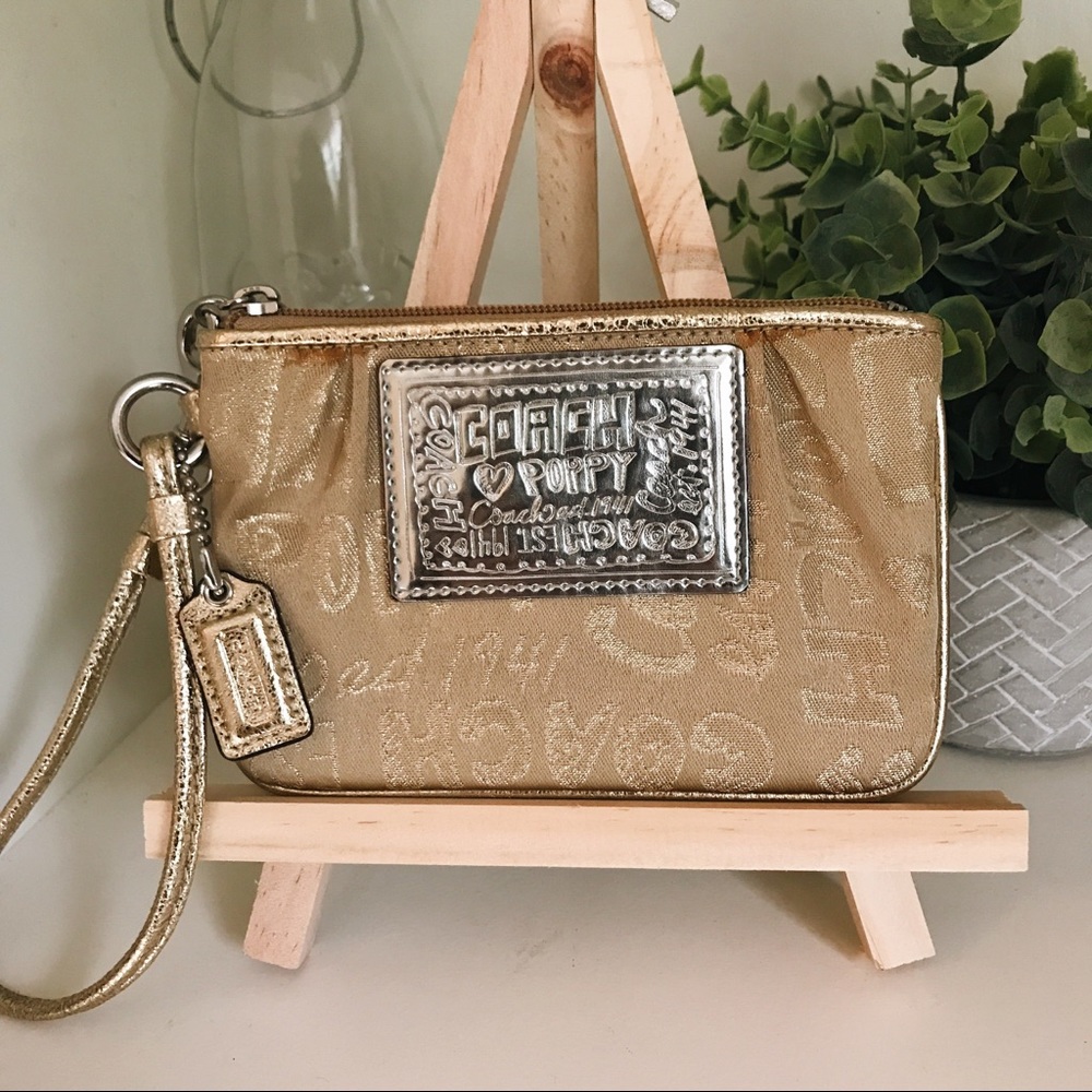 Coach wristlet wallet in gold